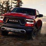 2019 Ram 1500 Rebel Red Front Driving Exterior.jpg