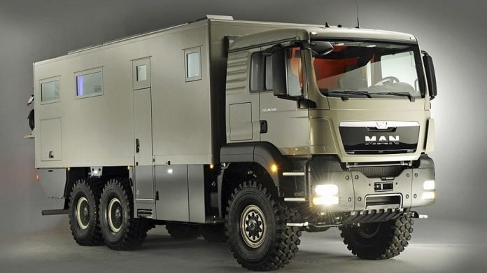 this-man-expedition-behemoth-comes-equipped-with-two-garages-for-your-toys_6