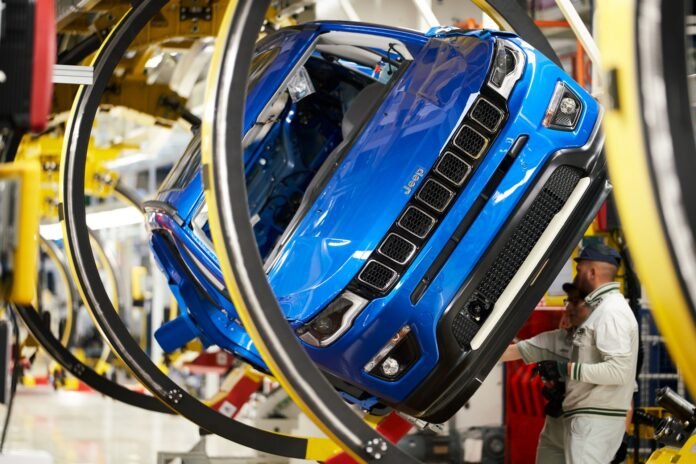 Spy shots have revealed that Jeep is developing a three-row version of the Compass, though we know it won’t wear the Compass name when it enters production. The photos have so far revealed little of the new seven-seat compact crossover, though it looks like it’ll borrow some styling cues from the brand’s most recent introductions – the Jeep Grand Cherokee L and the Wagoneer and Grand Wagoneer. Our friends at Kolesa.ru have ordered up a pair of unofficial renderings that preview the new Jeep’s design. The seven-seat Compass in the renderings wears the brand’s seven-slot grille flanked by a pair of headlights that swoop back over the fenders. The rendering continues to sport the regular Compass’s chunky wheel arches, D-pillar glass design, and rear end. The chrome piece that wraps around the greenhouse and underneath the rear hatch’s glass is present in the renderings, as are the regular taillights. Gallery: Seven-Seat Jeep Compass Renderings Seven-Seat Jeep Compass Renderings 2 Photos The new seven-seat Compass won’t be a carbon copy of the five-seat version, but they will have similarities in their design both inside and out. Rumors point to Jeep putting a turbocharged 2.0-liter under the hood that should make around 200 horsepower (149 kilowatts). It’ll power all four wheels through a nine-speed automatic gearbox. A smaller turbo 1.3-liter making 180 hp (134 kW) could propel the front-wheel-drive model. The current Compass sports a 180-hp 2.4-liter four-cylinder. When the larger Compass does arrive, it won’t be wearing the Compass name. Instead, rumors point to it getting the Patriot name, which Jeep used for a decade in the US on a compact five-seat crossover the company introduced in 2007 alongside the original Compass. While Jeep is eager to offer more seats in its US products, we don’t see the seven-seat Compass joining the lineup here. It’ll likely be reserved for developing markets like Brazil and India, though we should at least learn the model’s name early next month.